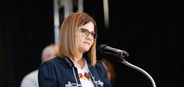 Rita Kókai, Mayor of the town of Gyermely at the lectern at the 650th anniversary of the town of Neuenhaus